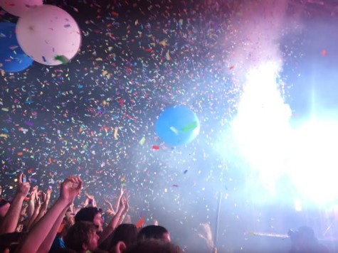 The front row of the Flaming Lips audience can hardly contain their excitement as confetti and balloons burst from the FedEx Stage at the Flaming Lips show on Friday, May 1.
