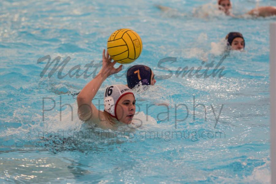 Roland Chang (10) passes the ball to his teammate during the SBA vs CBHS match.