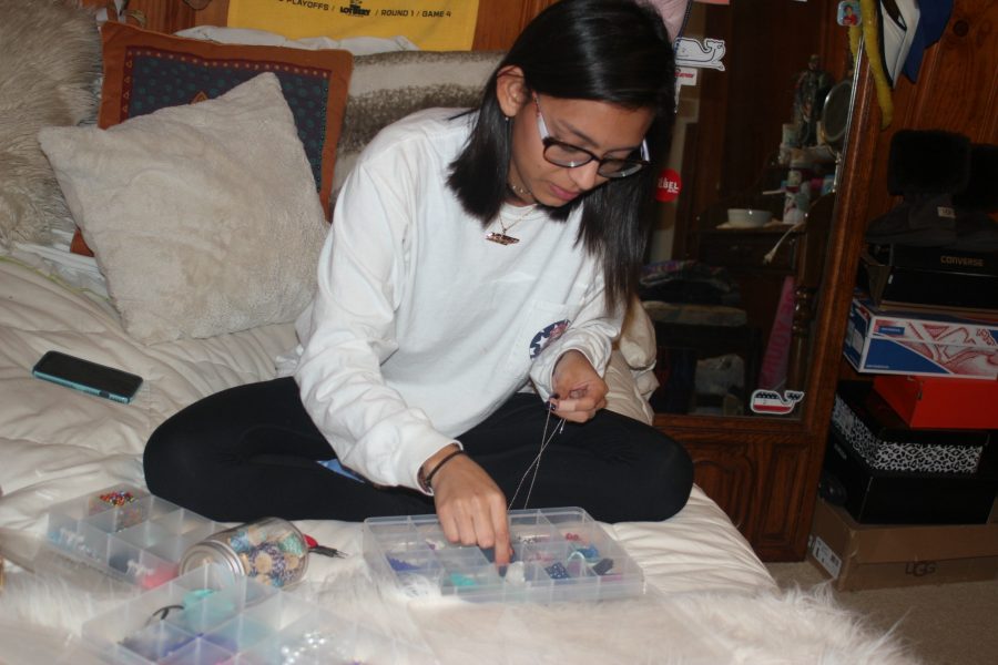 Michelle Oropeza makes trendy jewelry for her customers in the comfort of her own home. 
