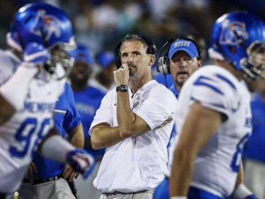Head Coach Mike Norvell ponders over the gameplan on the sidelines.
