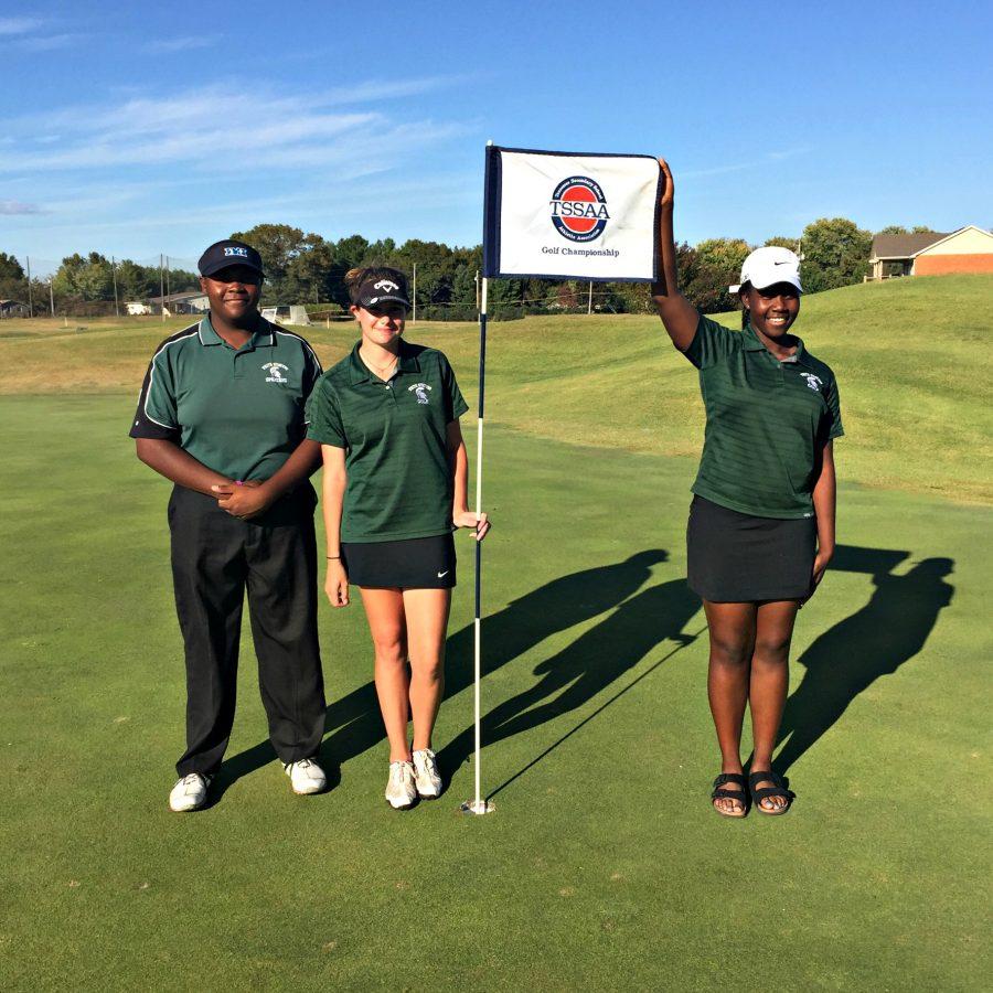 Spartan golfers, Joshua McCray (11), Danielle Rotz (11), and Bethany Dockery (11), pose after they qualified for the TSSAA Golf Championship.