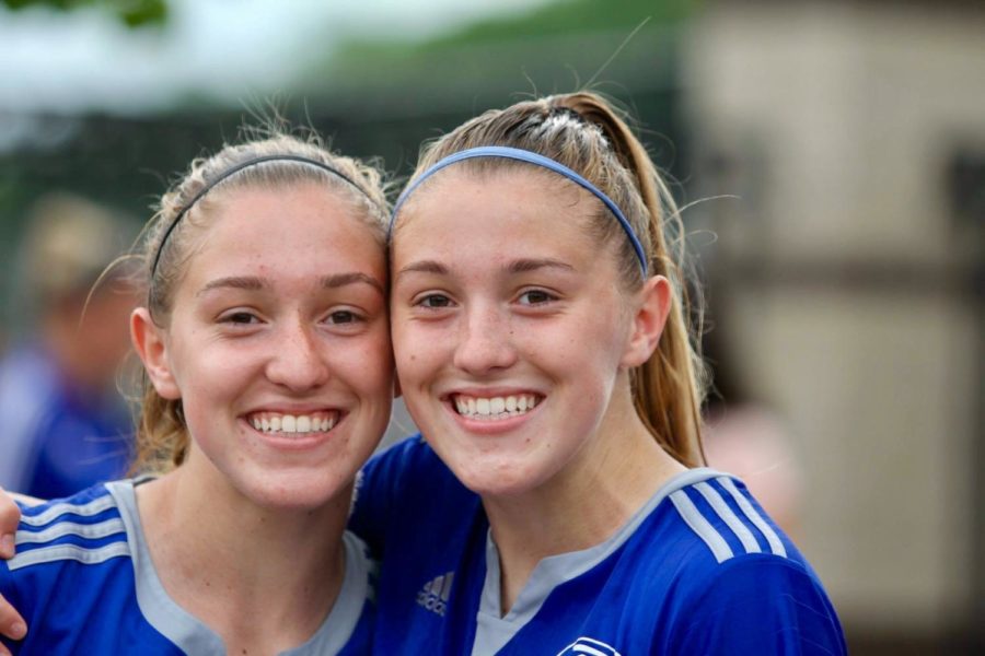 The Duncan sisters pose for a picture after a soccer game with their club, Lobos. The twins have been playing together since age three and committed the University of Memphis mid sophomore year.
