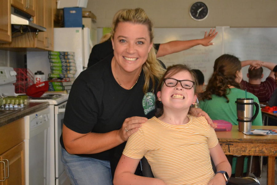 Tracy Stone and Annabelle Hulgan (9) in their classroom on the second floor of the main building. 