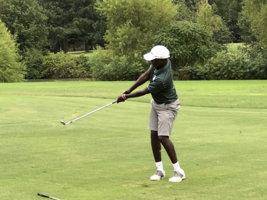 Nganga (11) chips the ball during a match at Fox Meadows Golf Course. He tied for 4th place at the Memphis Publinks tournament.