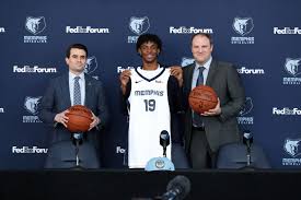  Rookie Ja Morant poses with new head coach Taylor Jenkins (right) and new GM Zack Kleiman (left). This offseason provided significant changes in both the Grizzlies front office and roster. 
