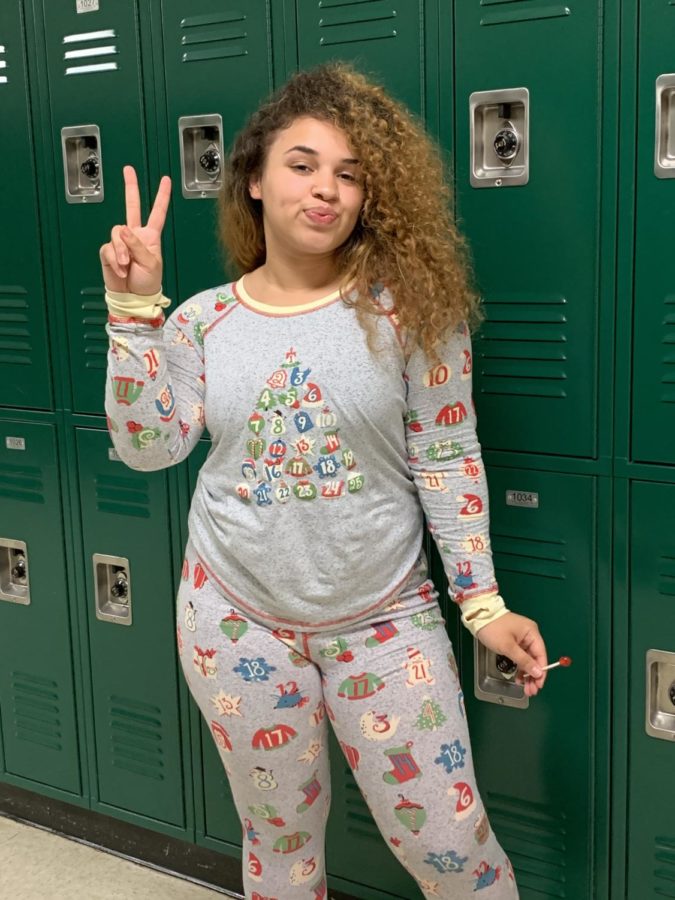 MaLiyah Hughes (12) posing in her Christmas themed outfit.