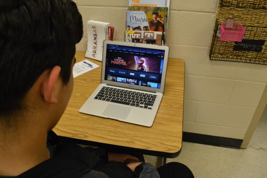 Antonio Villareal (11) browses Disney Plus for viewing options. The platform boasts over 8,500 programs with plans for expansion in the future; as of now, Disney+ encompasses original Disney channel shows and movies, Marvel, National Geographic, ESPN, Pixar and Star Wars.