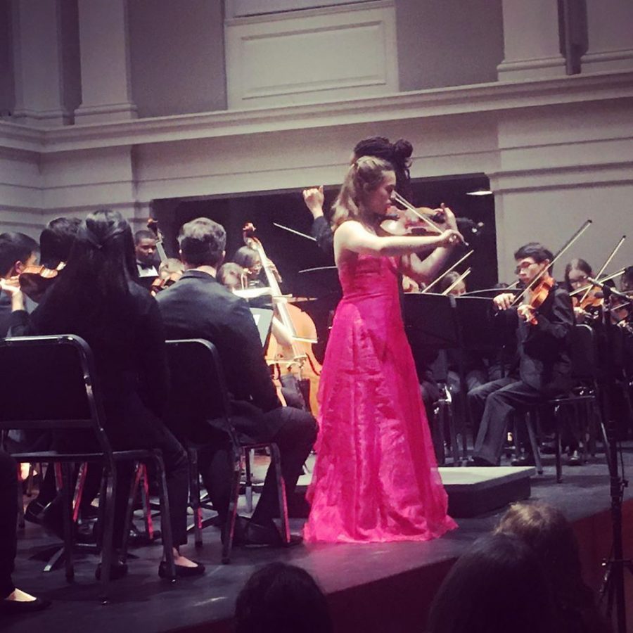 Soloist Zoe Wolfe fingers her way through the intricate and emotional notes of the Lalo violin concerto in concert. Months of preparation went into the performance, including Wolfe’s participation in the Memphis Youth Symphony’s concerto competition, which won her spot in the concert season.