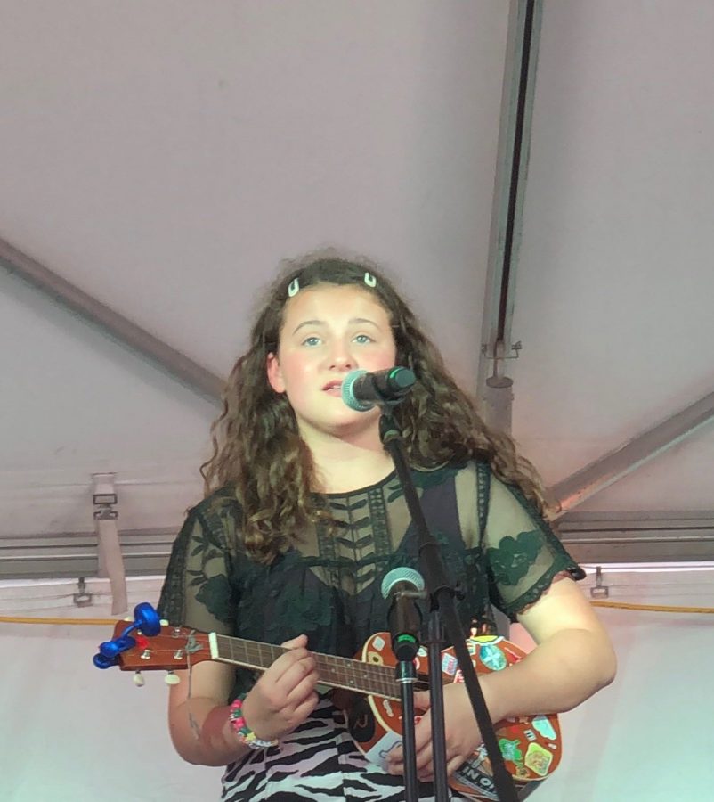 Laura Lang (10) performs original songs “Too Much”, “A Good Time” and “Purple Lights” live at the 2019 Delta Fair. They accompany their vocals with ukulele.