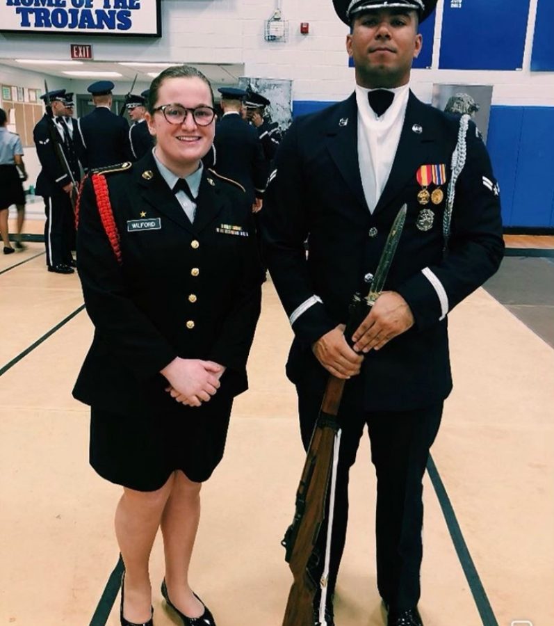Annie Wilford (11) (left) serves as the deputy commanding officer of the Spartan Battalion. Through JROTC and other clubs, Wilford has discovered an interest in politics and law which she hopes to work in after serving.