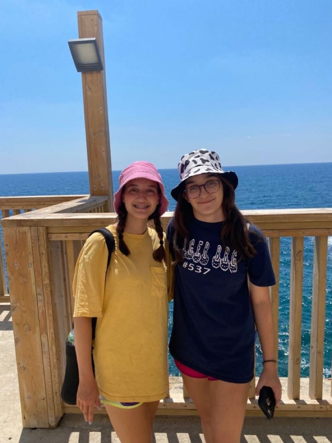 Abby and Mandy Cassius (12) pose near Achziv beach after learning about the Rosh Hanikra grottoes. This was one of their many stops during their month-long vacation in Israel.  
