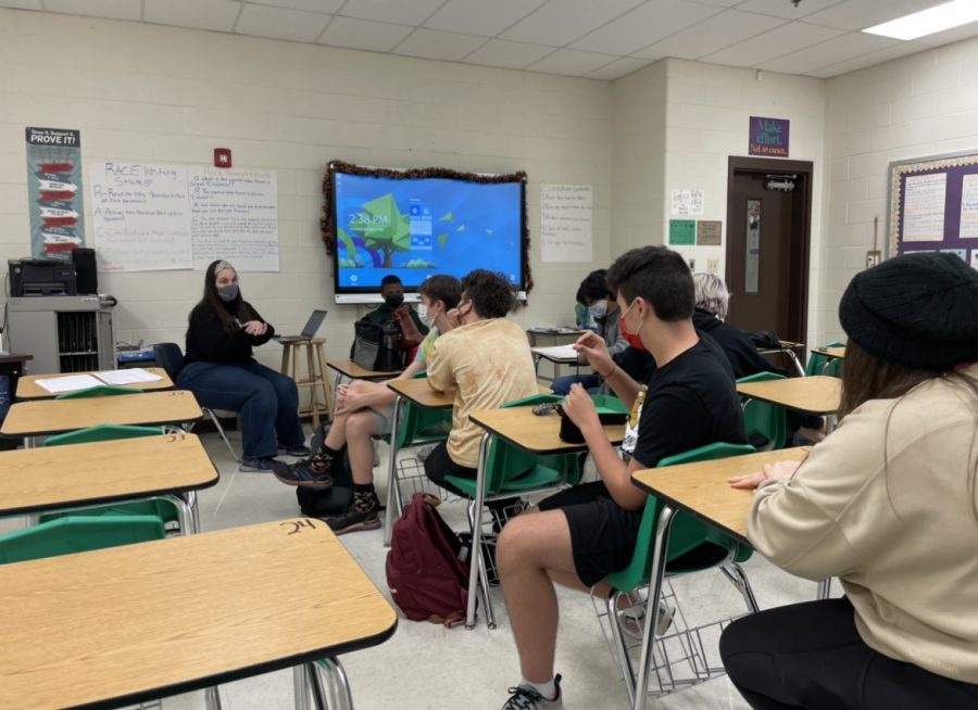 In room F128, the club members sit down listening to Ellen Dunn, the club sponsor, break the news that Samuel Naids could no longer be a sponsor. Teacher Luis Herrera and Dunn, have made adjustments in order for the club to continue. 
