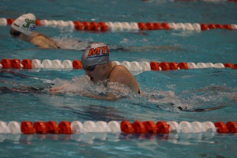 Paxton Smythe (12) swims in the 100 meter breaststroke event at Southeasterns in Knoxville, Tenn. Alongside racing on behalf of the White Station Swim Team, Smythe competes individually in many meets across Tenn. and the nation to gain experience and recognition. 