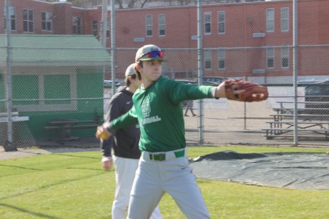 Hank Hisky (12) is perfecting his throws in preparation for the season. For him, this year will be the last chance to win a district title with White Station.