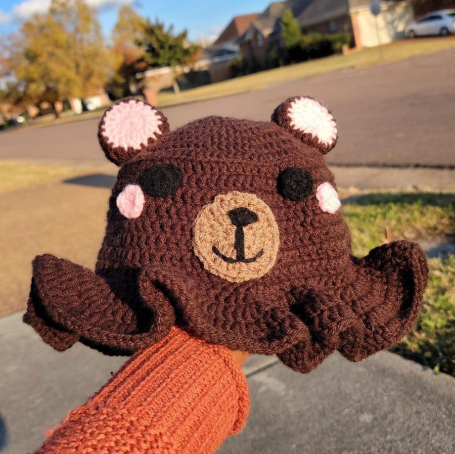 Shakira+Townsend+%2811%29+shows+off+one+of+her+many+crochet+projects%2C+a+handmade+bear+bucket+hat.+Townsend+was+persuaded+by+her+friends+to+make+a+business+out+of+her+crochet+hobby%2C+which+she+promotes+on+Instagram.