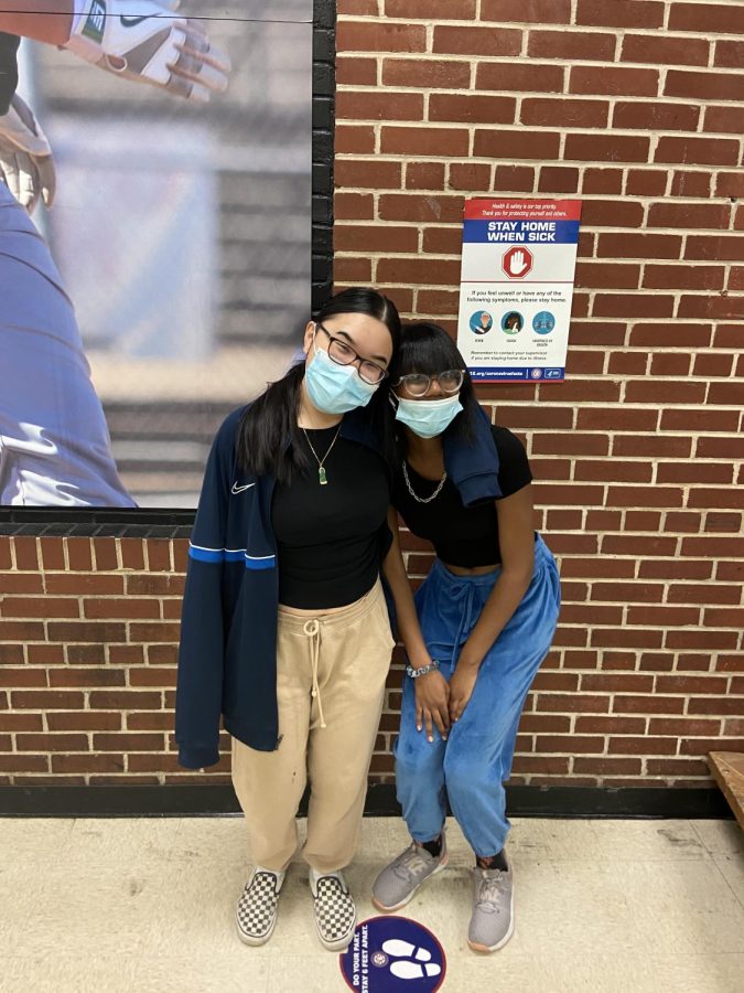 While the traditional and optional programs have many differences, students from each can still come together to enjoy various activities during and after school. Kathy Lam (11) and Macaya Wright (11) maintain a close friendship despite coming from two different programs. 