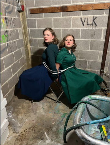 Dedicated student actors Sarah Cameron(10) and Kylie Scott(9) are tensing up the scene in preparation for the new theater production to fulfill its suspense. 