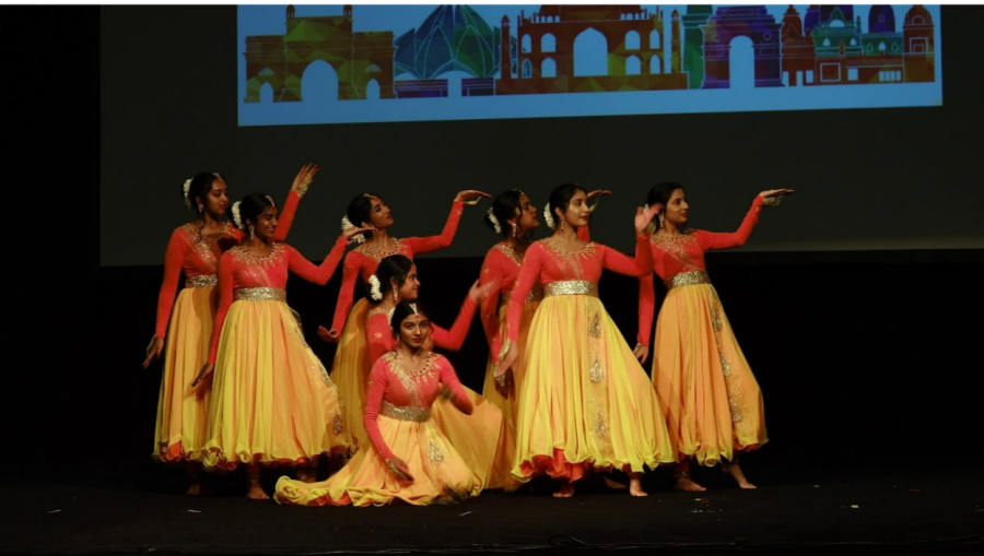 High school students dancing at the 2019 India Fest take their final pose as their performance comes to an end. They received a standing ovation from the audience when they finished their choreography to the popular Bollywood song “Ghar More Pardesiya.”