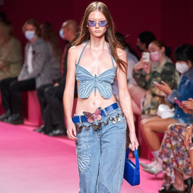 This outfit is featured in the model Blumarine’s Spring 2022 collection, which includes Mariah Carey’s Y2K butterfly top. The designer, Nicola Brogano, seeks inspiration from Y2K icons like Paris Hilton and Britney Spears