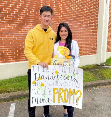 Annie Zhao (12) cheerfully poses with her date, Shawn Meng (12), after he promposed with a Ruth B. themed poster and personalized basket. The pair are excited to dress up in their “Hollywood Glam” attire to make Prom 2022 a memorable night.
