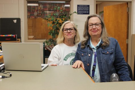 Susie Carlson (left) and Cathy Doyle (right) come into the library everyday to assist students and faculty with whatever they may need. After several years of working in the library, the two made the decision to leave it behind and venture into new experiences.