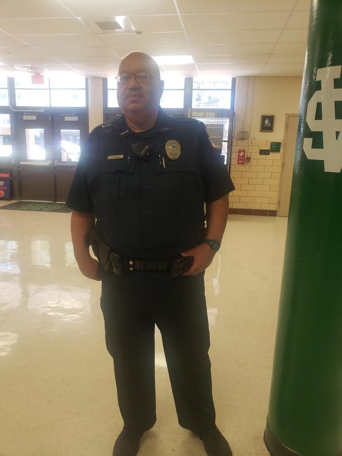 Security Guard Thomas Lomax stands watch in the front lobby of the Main Building. Patrolling the hallways for students, intruders and more is one of his main job responsibilities.
