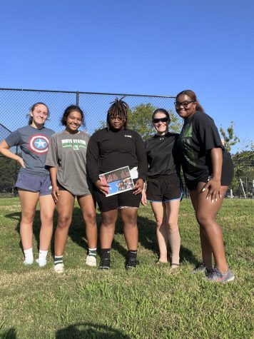 The White Station Girls Rugby Team concludes its first practice of the fall season with the 901 Rugby Club on Tuesday, Sept. 13th. Posing with a flyer, the team is eagerly recruiting to build their team for the season. 