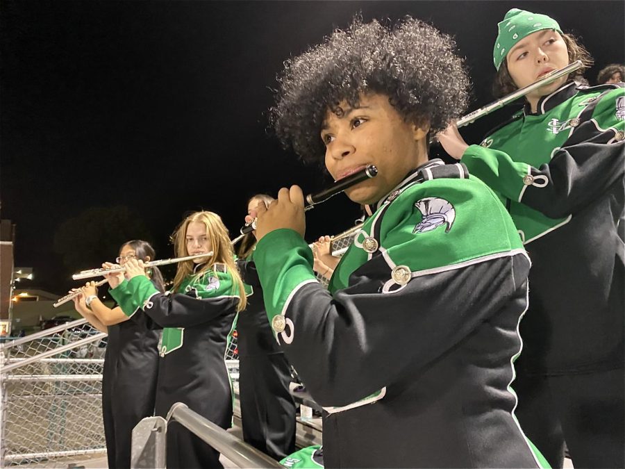 Cayenne Stevens (12) plays Seven Nation Army on the flute. As part of the marching band, it is Stevens’s job to help hype up students and show support for the football team.