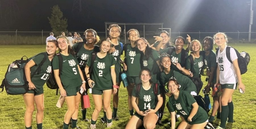 The girls soccer team celebrate a win against - together. Zoe Taylor (9) is excited and ready to spend the rest of the season bonding and growing as a team. 