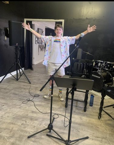 Simon Schoenberger (11) poses in one of The Song Shack’s rehearsal spaces. Equipped with drums, guitar and other instruments, these rooms serve as havens for creative thinking and production.
