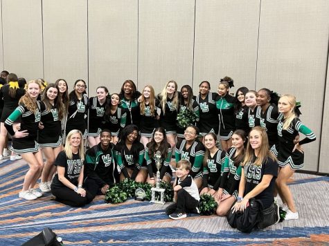 The Spartan varsity cheer team celebrates a first place win on Oct. 29 in the Mid-South Regional Cheer competition. The team will travel to Disney World in February of 2023. 
