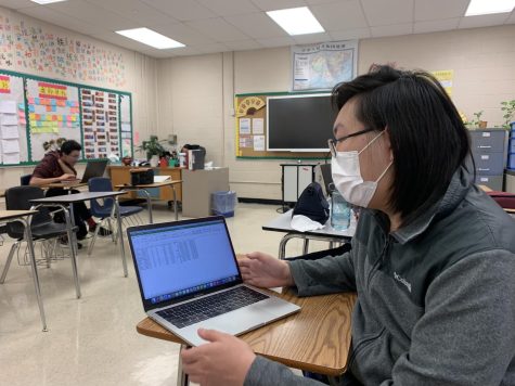 Anyu Gu (12) shows off his organizational spreadsheet for his college applications. Gu is applying to over 10 schools – a feat requiring much organization.