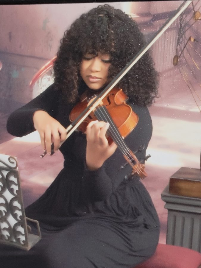 One of the 40 11th and 12th grade violin players from West Tennessee who earned a spot at All-West, Charisse Conard (12) plans to pursue either a double-major or minor in music in college. Conard has played the violin for nine years.