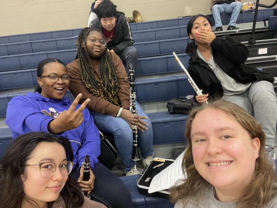 (From bottom left clockwise) Aylla Wexler (9), Hayley Matthews (10), Masie Robinson (9), James Yue (9), Milagros Perez (10) and Ellie Carr (9) pose in the warm-up area on Jan. 14 and later became six of White Station’s many students to place at the competition. The host school for the auditions, South Gibson County High School, allowed for the gym to be a space for students to warm-up before their auditions. 
