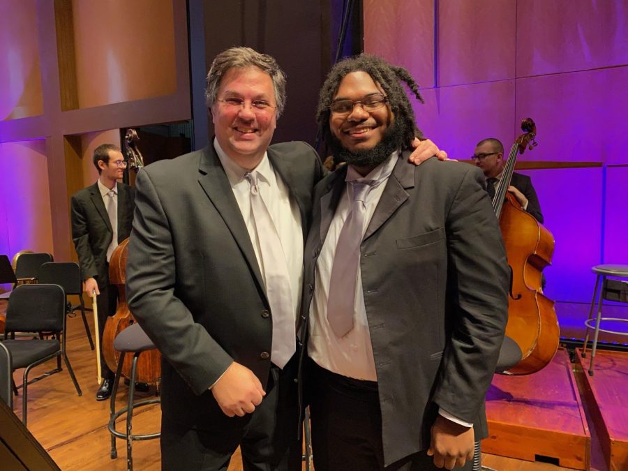 Andrew Palmer (left) poses with former student Matthew Finley at a side-by-side concert with the Memphis Symphony Orchestra and students from the University of Memphis. Palmer inspired Finley on his orchestra journey, when he taught him at Willow Oaks Elementary.