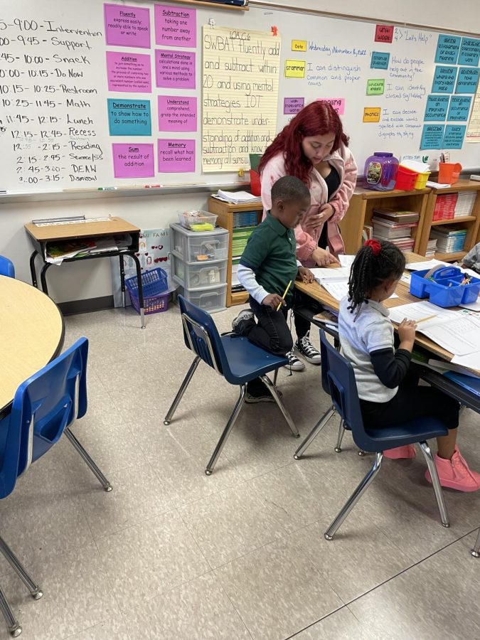  Lilly Rodriguez (9) works with White Station Elementary students in small groups. She has taken courses on how to better improve her teaching skills before entering the profession.
