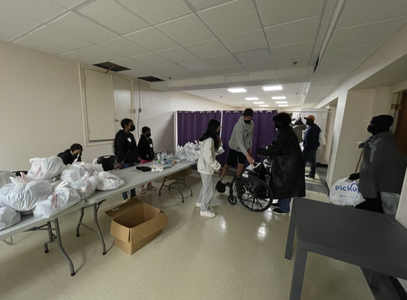 Key Club and Health Occupations Students of America members provide support to the homeless population of Memphis. Products such as gloves, socks and wet wipes were given out as well as clean clothes and flu shots.