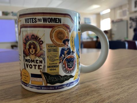  U.S. History, AP Seminar and AP Research teacher Montana Young has many trinkets representing women’s rights and suffrage, including a coffee mug. A previous student of Young’s gifted her the mug.
