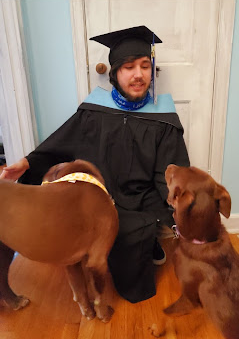 During the virtual school year, Dylan Lira’s dogs kept him company as he spent most of his time at his desk, teaching and studying. He was able to graduate in 2018.