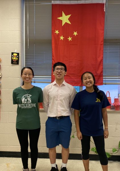  International Bible Club sponsor, FIRST NAME Harris, poses with Joseph Li (11) and Lucia Yang (10). As members of the Memphis Chinese Evangelical Church, they plan to share the word of God with White Station High School. 