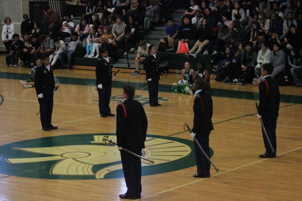 The Honor Guard lines up to present the Homecoming Court during the Homecoming pep rally on October 6. Later that day, the Honor Guard performed the same routine to present the court at the Homecoming football game.
