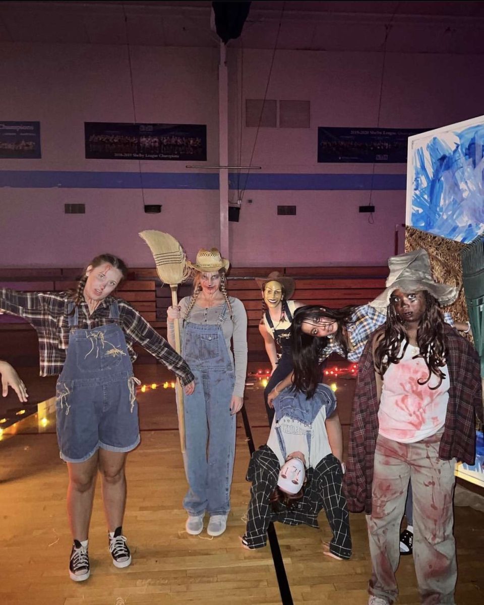  Disguised as monsters and ghouls, St. Mary’s students pose for their annual Halloween bazaar. The bazaar is a long standing tradition at St. Mary’s.