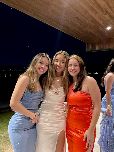 From left to right, Sari Richmond (12), Elaina Chen (12), and Kate Engstrom (12) attend  Christian Brother High School’s prom. The prom was held at the Fedex Event Center in Shelby Farms on April 28. 