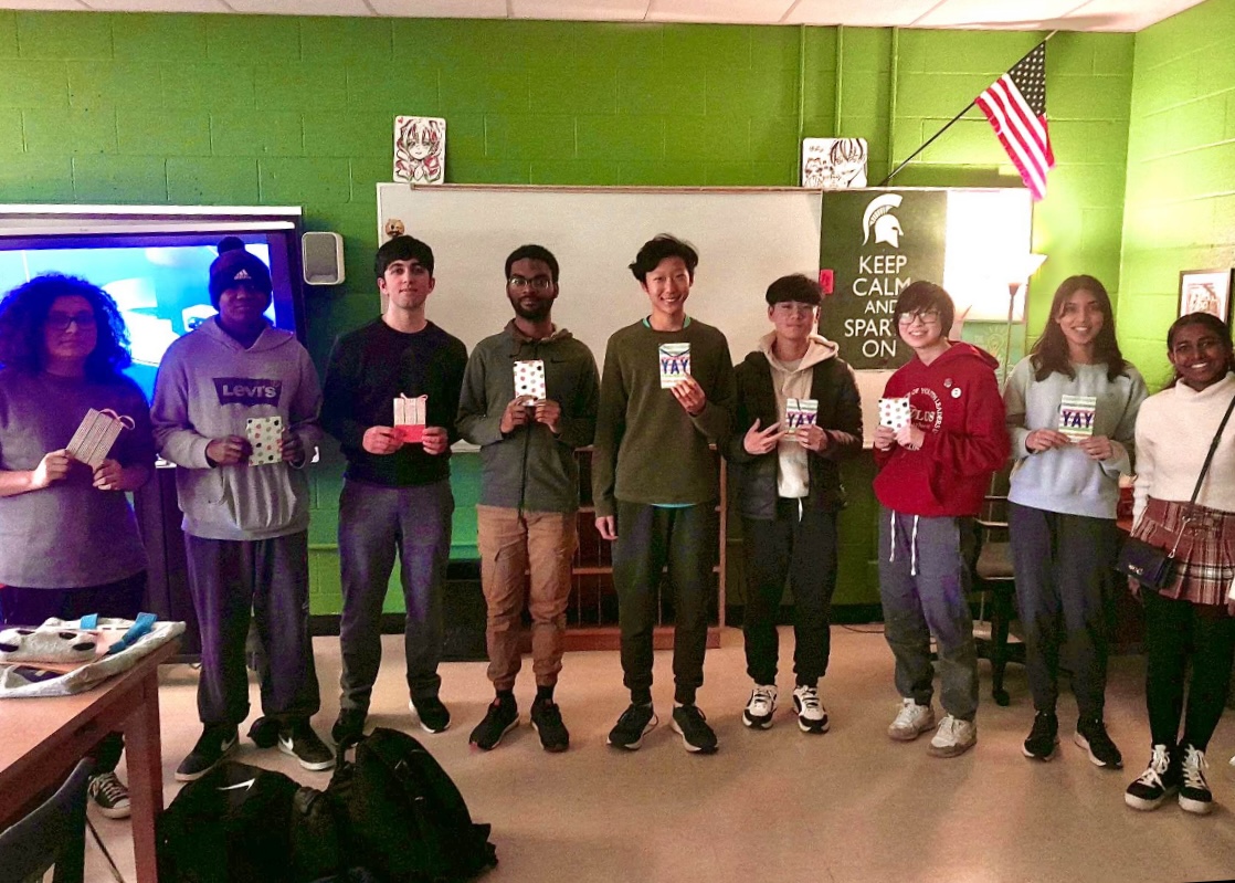 Winners of the hackathon show off their prizes alongside organizer and Entrepreneurship Club president Aditi Arunprakash (10). The Hackathon was sponsored by Chick-Fil-A, who also provided gift cards for prizes.