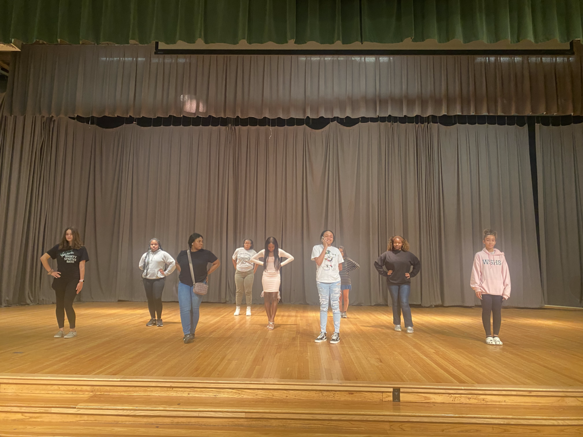 A+group+of+students+rehearses+their+part+for+the+Black+History+Month+program+in+the+auditorium.+For+the+past+few+weeks%2C+groups+have+been+practicing+multiple+times+a+week+to+be+ready+for+the+program+on+February+26.