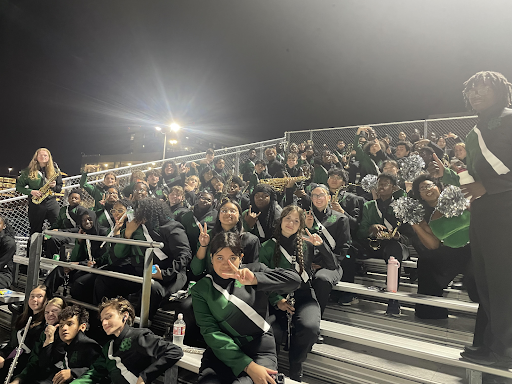 The marching band program participates in almost every Friday football game. They practice multiple days a week during the marching season to prepare for these games. 