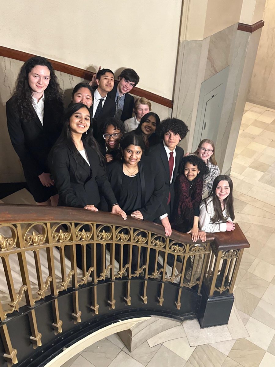 The+White+Station+mock+trial+team+poses+for+a+picture+on+competition+day.+The+team+competed+at+the+Shelby+County+Courthouse+in+downtown+Memphis.