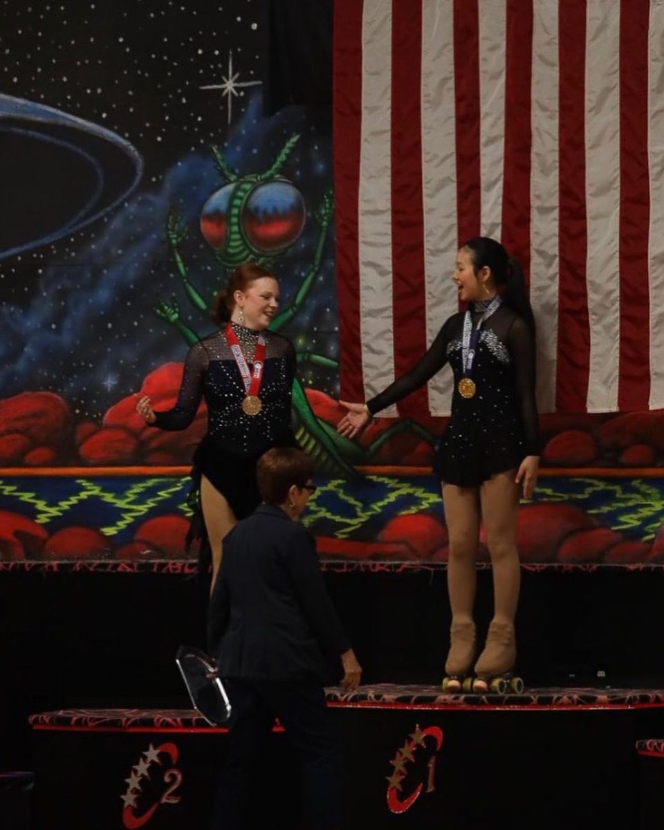 (Left) Allison Brumbaugh (9) received her medal at a regional competition for artistic roller skating in 2024. Out of all of the disciplines within competitive roller skating, Brumbaugh focuses on dancing and has been skating since sixth grade.