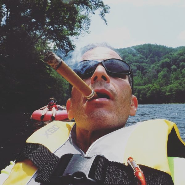 William Coulter, a White Station High School chemistry teacher, floats down a river. In his free time, Coulter enjoys running, kayaking and thinking about what he’s going to do after retiring. 