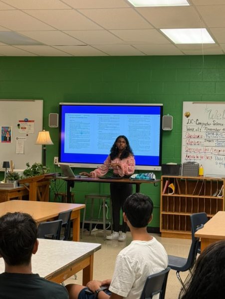 Aditi Arunprakash (11) gives a presentation during the 901 Hacks Championship. Arunprakash founded the Entrepreneurship Club, which hosted the competition, during the 2023-2024 school year.